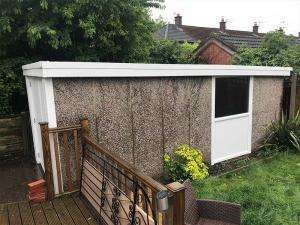 Concrete garage white side hinged garage door | Danmarque Garages